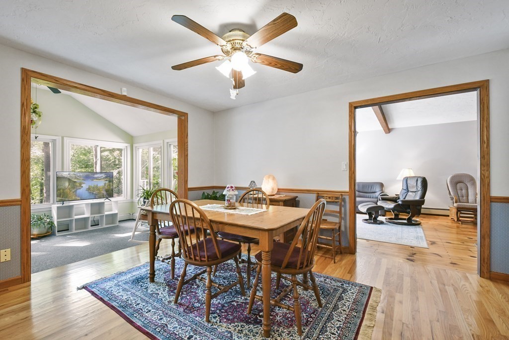 60 Lincoln Point Road Charlton, MA 01507 - Photo 12 of 42 a view of a dining room with furniture and wooden floor