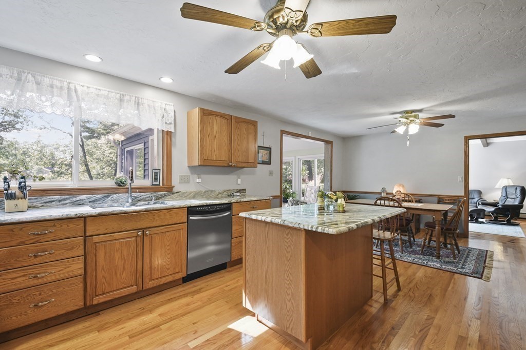 60 Lincoln Point Road Charlton, MA 01507 - Photo 17 of 42 a very nice looking kitchen with granite countertop a stove sink and cabinets