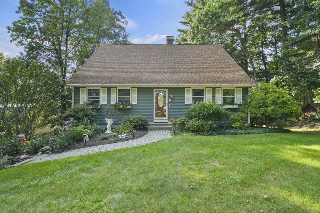 60 Lincoln Point Road Charlton, MA 01507 - Photo 2 of 42 a house that has a lot of plants in it