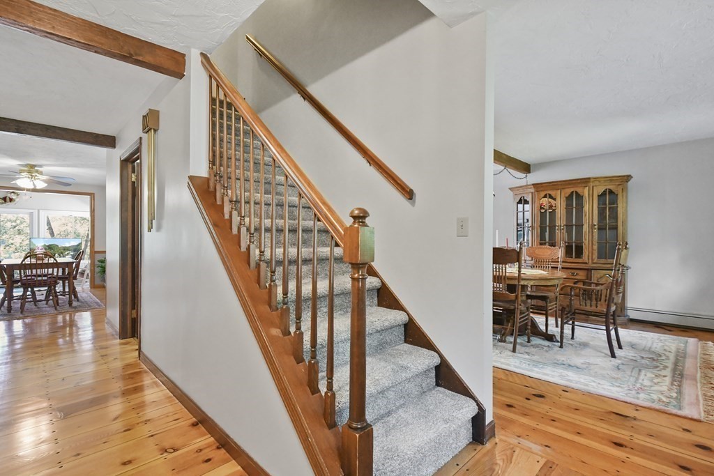 60 Lincoln Point Road Charlton, MA 01507 - Photo 3 of 42 a view of entryway and dining room with furniture