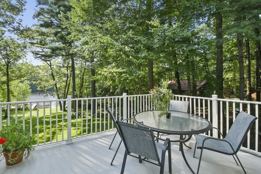 60 Lincoln Point Road Charlton, MA 01507 - Photo 40 of 42 a view of a chair and table in the garden