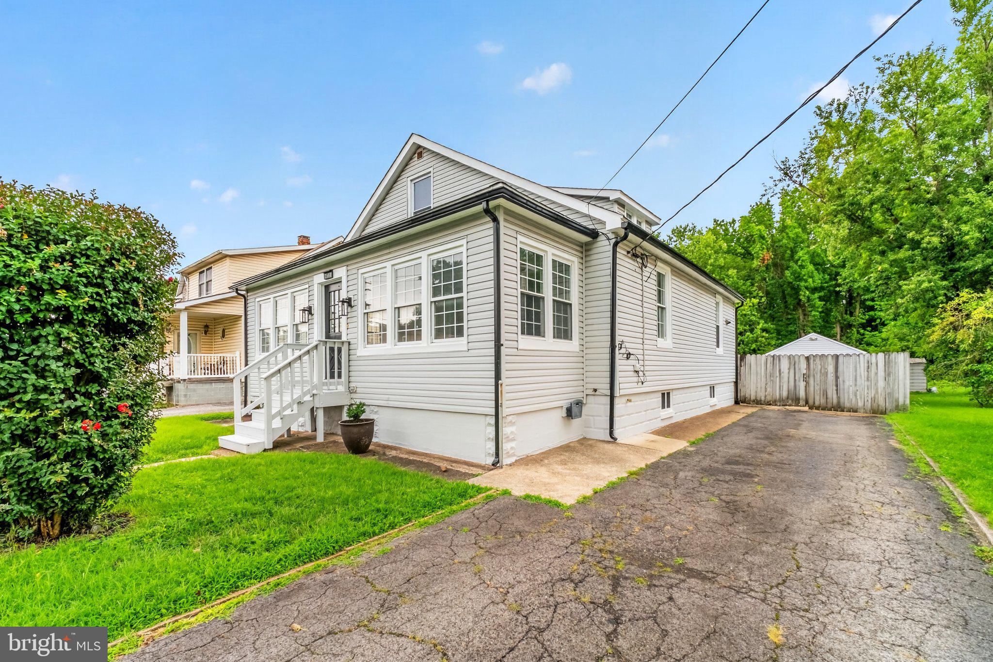 2317 Ruth Avenue Baltimore, MD 21219 - Photo 29 of 29 Charming home with lush green surroundings.