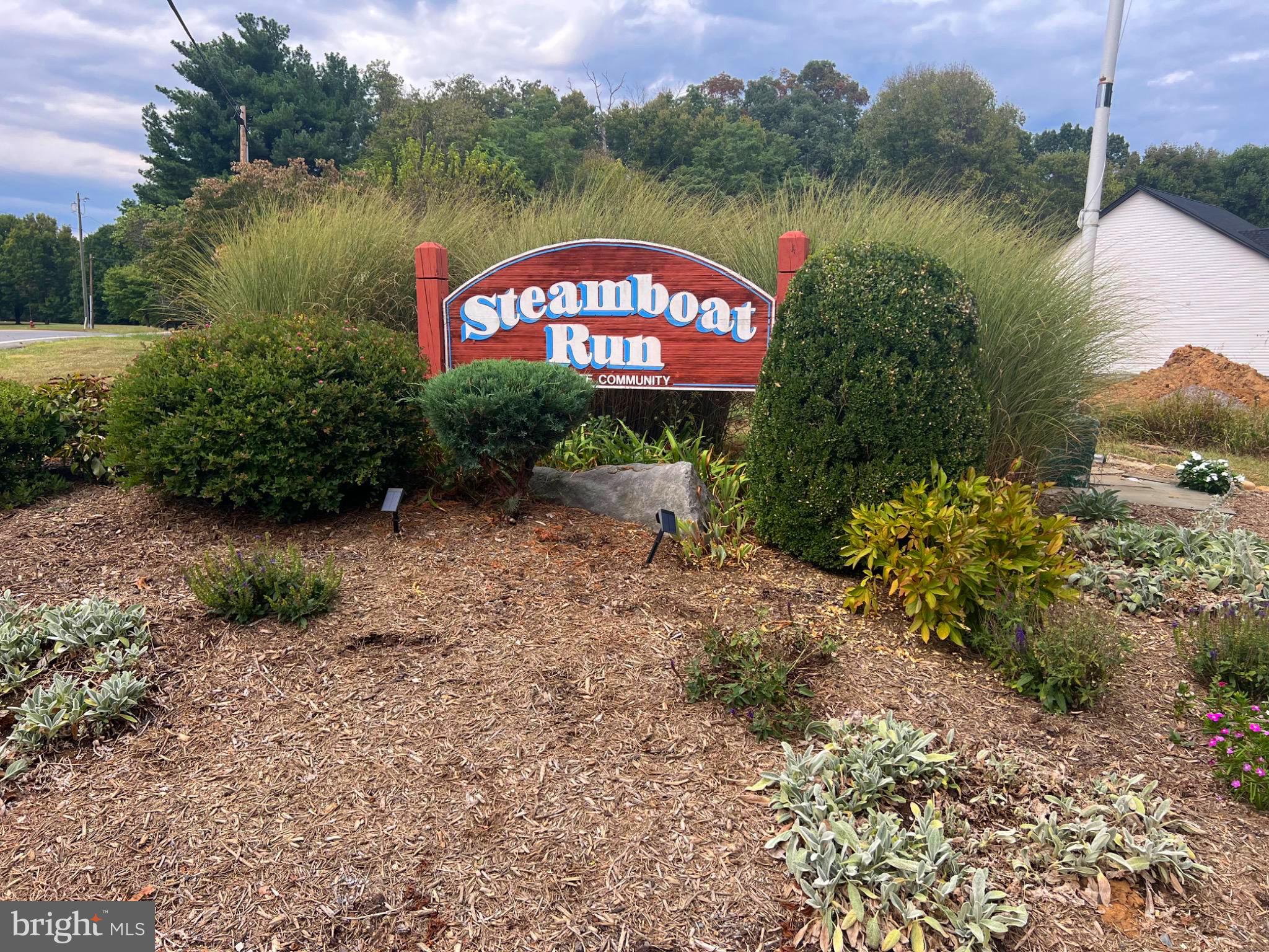 Lot 4 Steamboat Run Road Shepherdstown, WV 25443 - Photo 5 of 29 a sign that is sitting on a lake