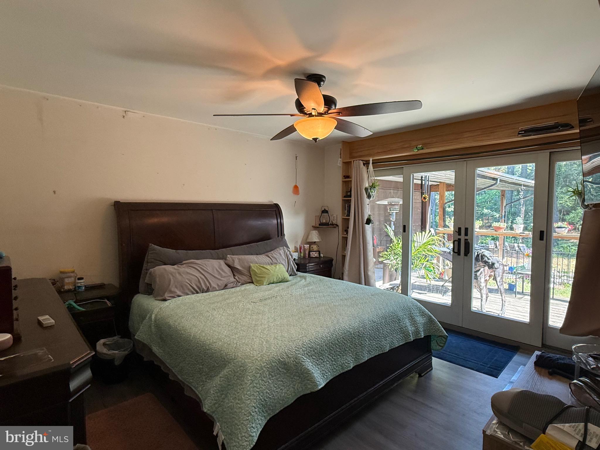 1214 Johnson Road Salisbury, MD 21804 - Photo 44 of 59 a bedroom with a bed ceiling fan and a window