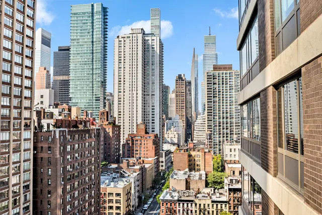 a bathroom with a shower and a toilet