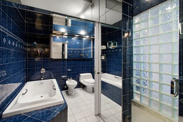 a balcony with chairs and with furniture