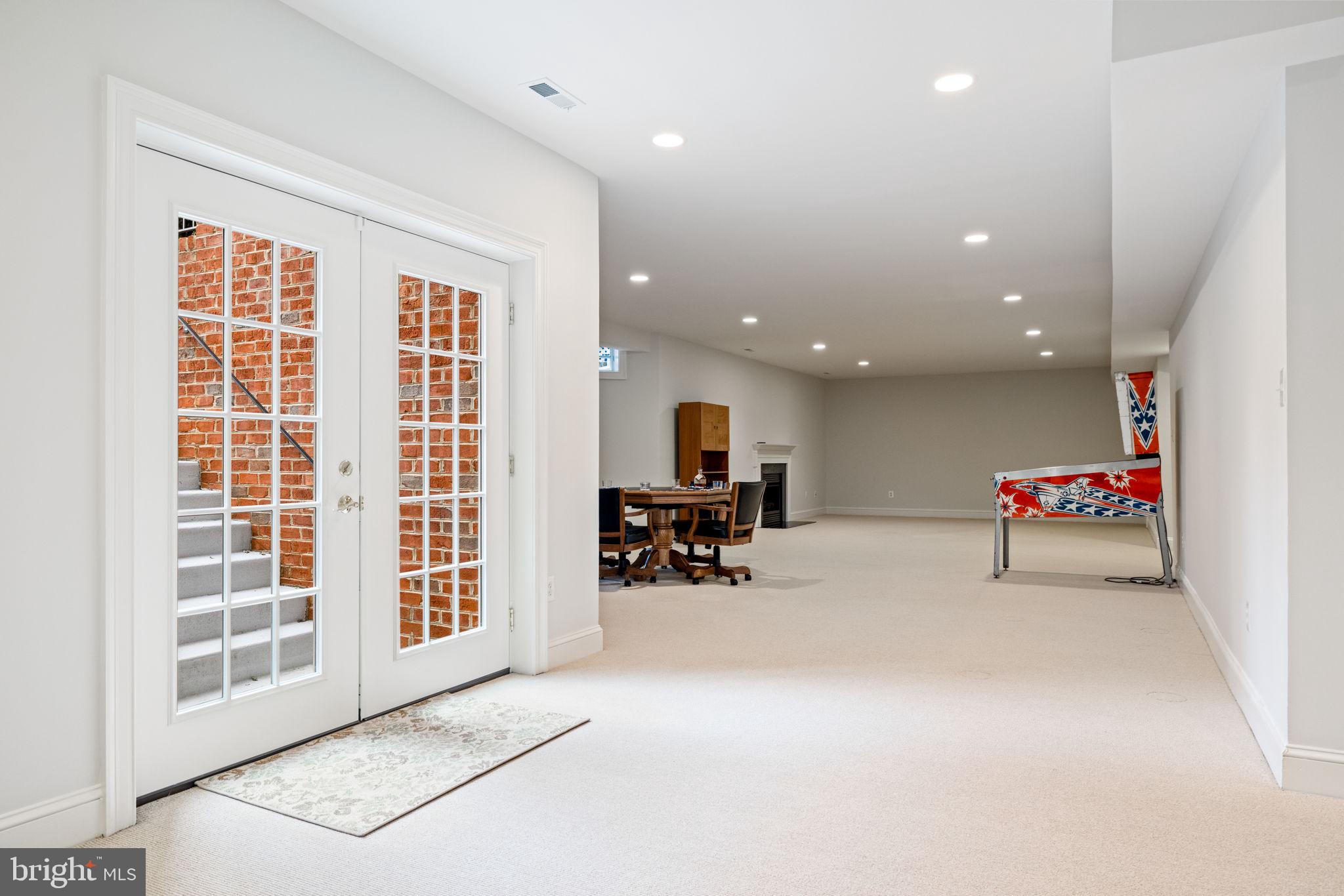 41741 Raspberry Drive Leesburg, VA 20176 - Photo 112 of 117 a living room with furniture and a chandelier