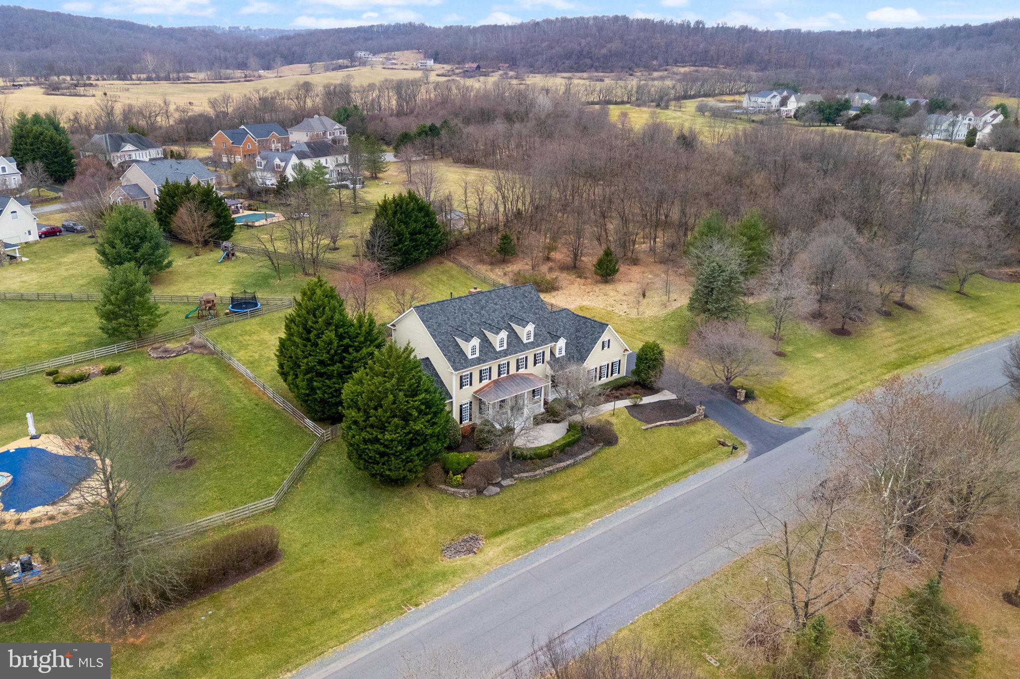 41741 Raspberry Drive Leesburg, VA 20176 - Photo 12 of 117 an aerial view of a house with a yard