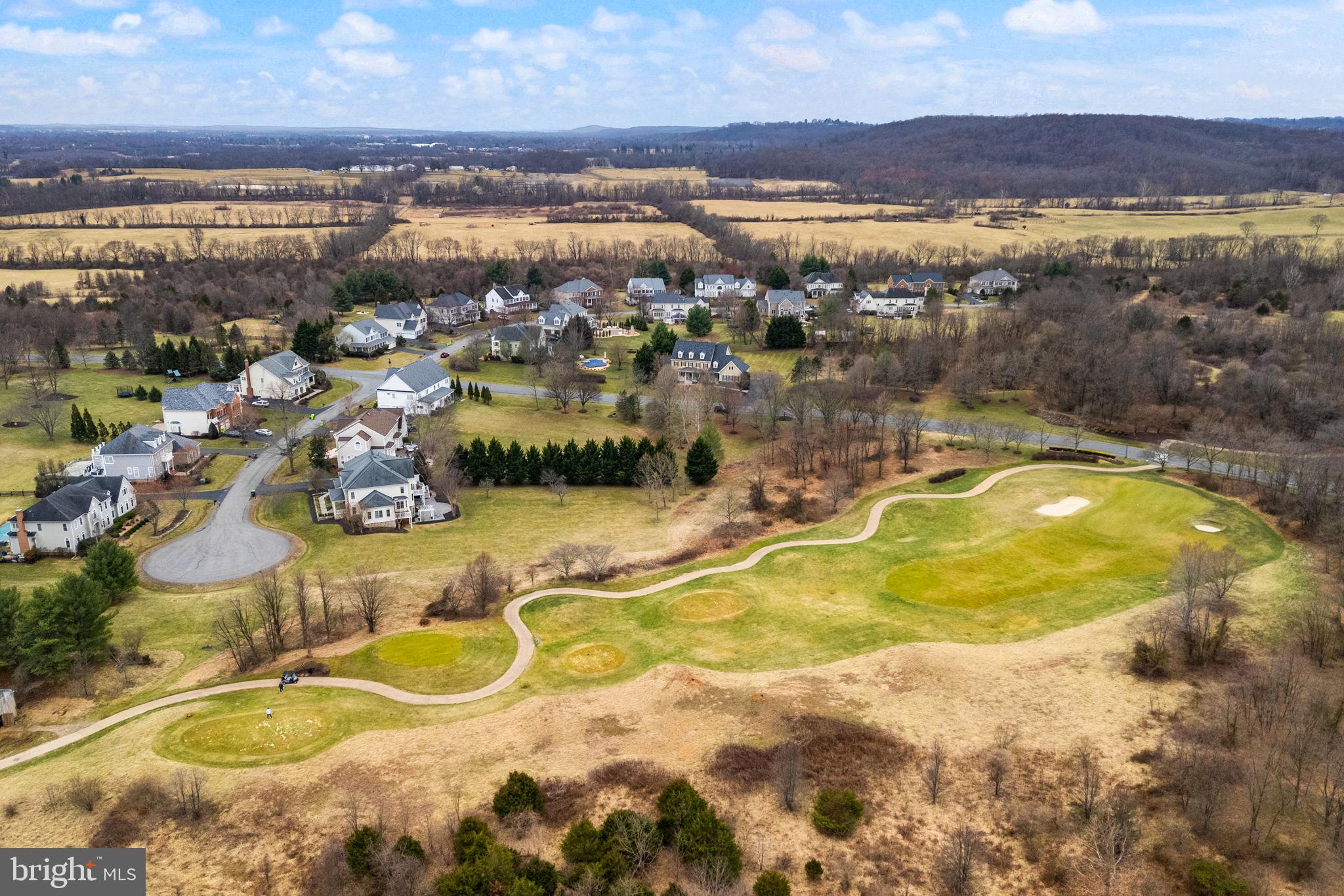 41741 Raspberry Drive Leesburg, VA 20176 - Photo 13 of 117 a view of a swimming pool with an ocean view