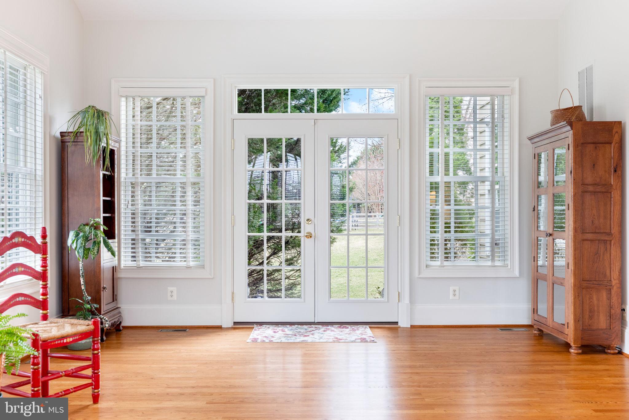 41741 Raspberry Drive Leesburg, VA 20176 - Photo 36 of 117 a view of an empty room with wooden floor and a window