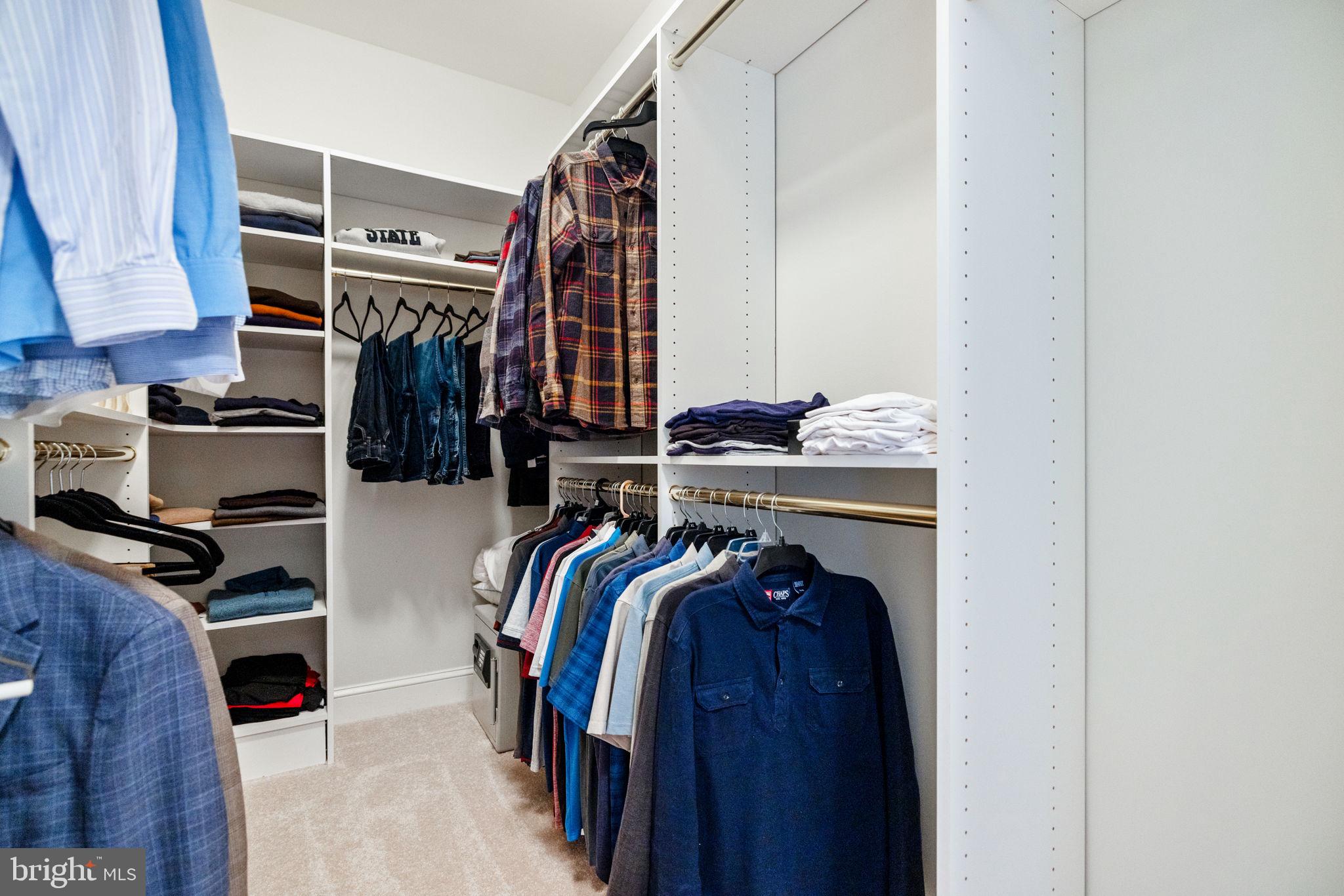 41741 Raspberry Drive Leesburg, VA 20176 - Photo 73 of 117 a view of walk in closet with clothes and shoes