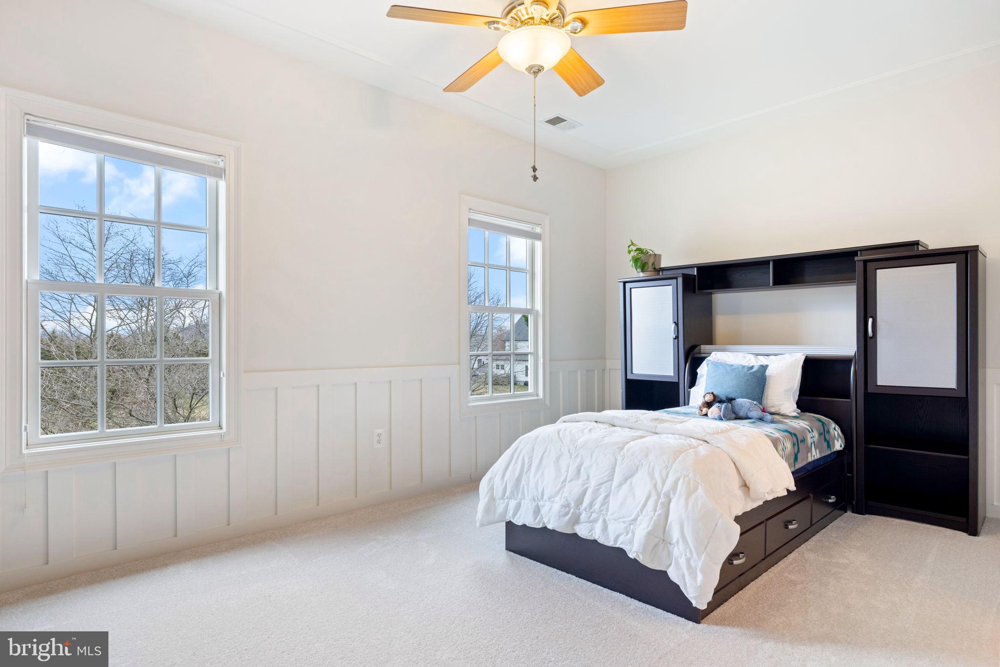 41741 Raspberry Drive Leesburg, VA 20176 - Photo 94 of 117 a bedroom with a large bed and a window