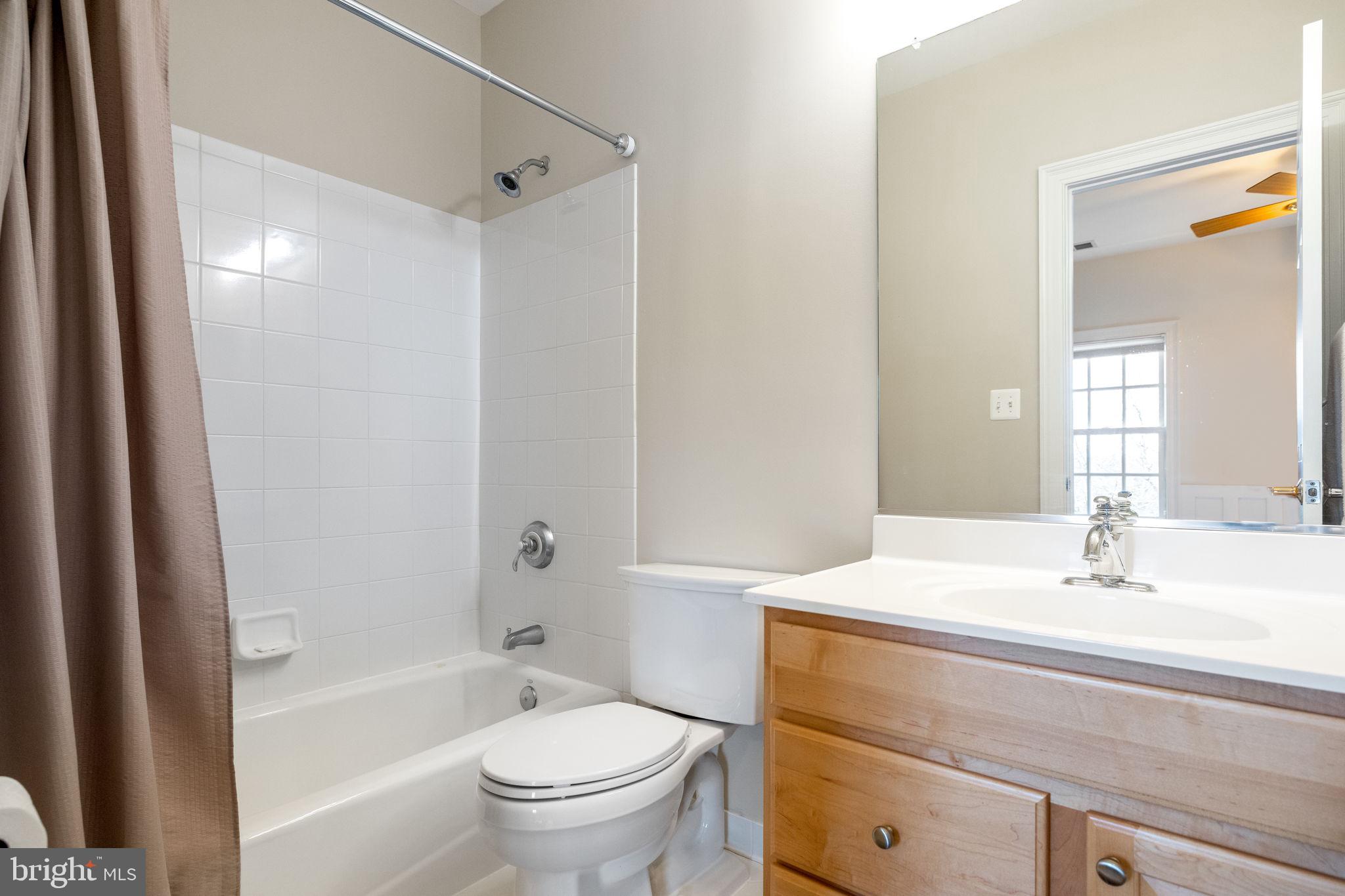 41741 Raspberry Drive Leesburg, VA 20176 - Photo 96 of 117 a bathroom with a sink toilet and shower