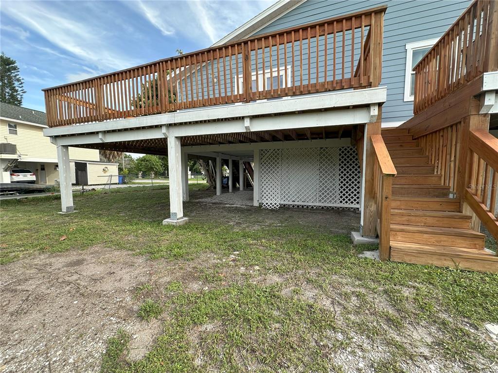 3303 West Shell Point Road, Unit B Ruskin, FL 33570 - Photo 20 of 22 a front view of a house with garden