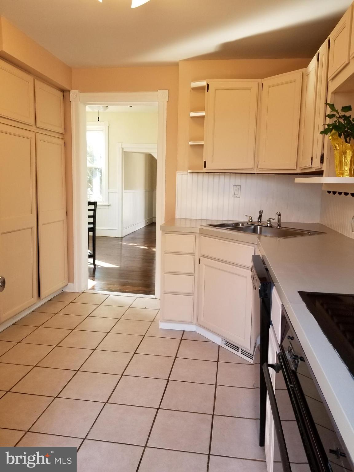 100 Main Street Bridgeport, NJ 08014 - Photo 11 of 24 Kitchen to Dining Room