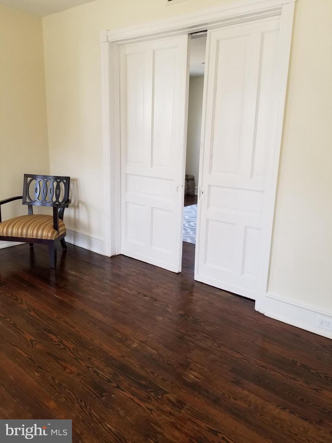 100 Main Street Bridgeport, NJ 08014 - Photo 7 of 24 Living Room - Pocket Door
