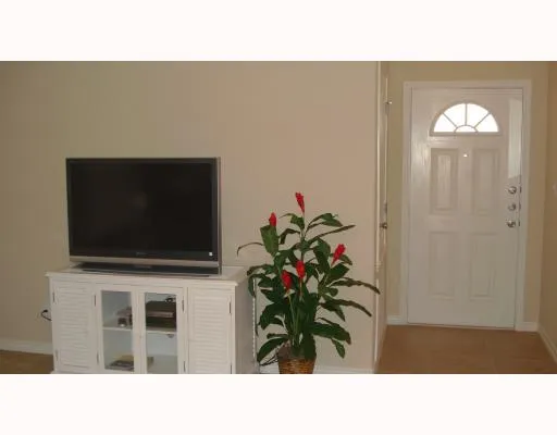 a black and white photo of a living room