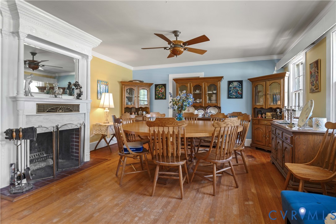6243 Studley Road Mechanicsville, VA 23116 - Photo 4 of 65 a view of a dining room with furniture window and wooden floor