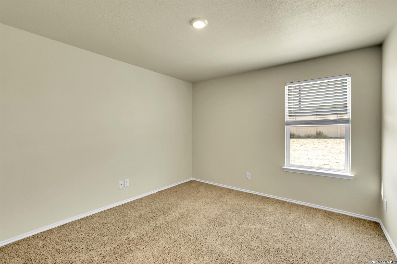 7639 Hercules Point San Antonio, TX 78252 - Photo 15 of 28 an empty room with a window