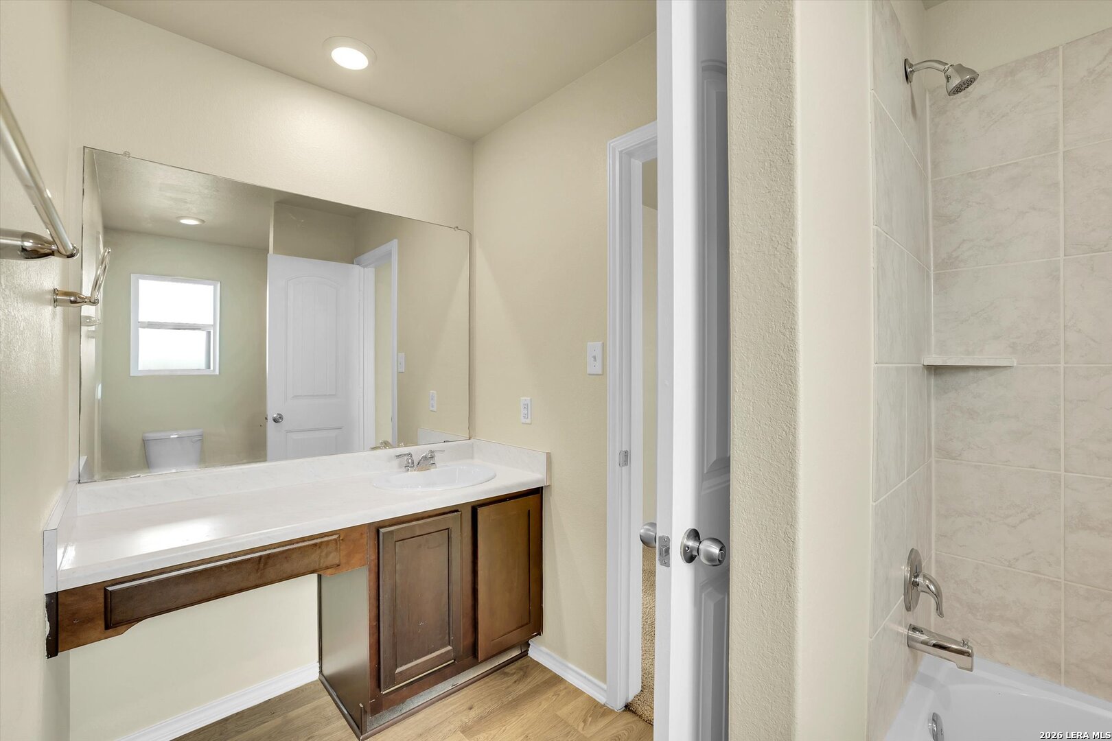 7639 Hercules Point San Antonio, TX 78252 - Photo 16 of 28 a bathroom with a sink and a mirror