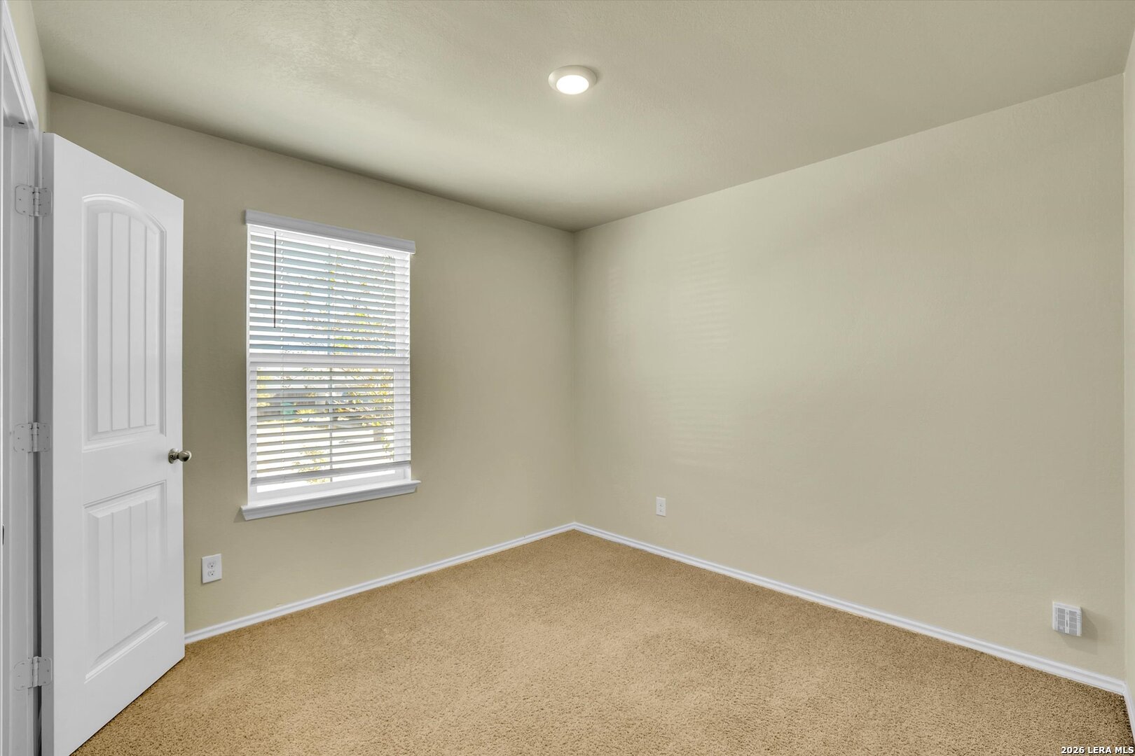 7639 Hercules Point San Antonio, TX 78252 - Photo 21 of 28 an empty room with a window
