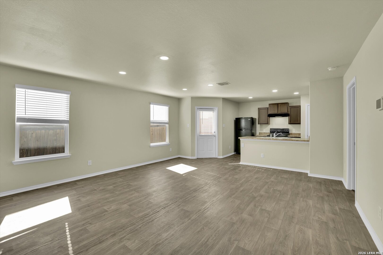 7639 Hercules Point San Antonio, TX 78252 - Photo 4 of 28 a view of large kitchen with a sink and a large window