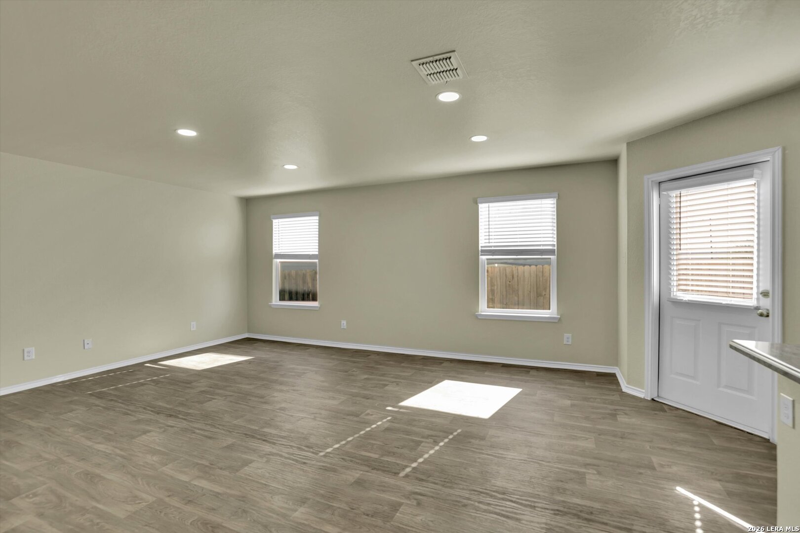 7639 Hercules Point San Antonio, TX 78252 - Photo 5 of 28 a view of empty room with windows