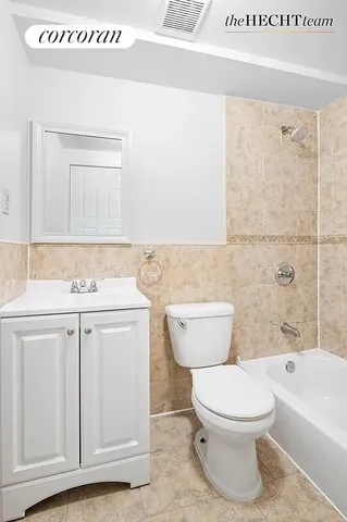 a bathroom with a sink a toilet and bathtub