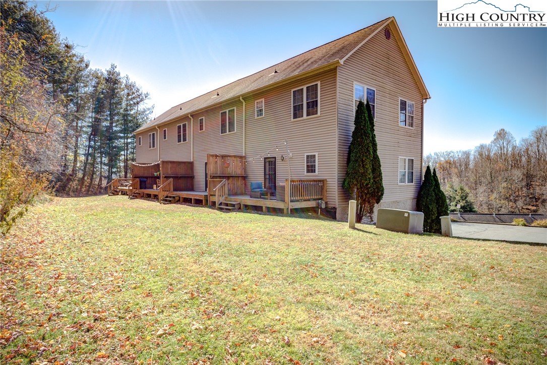 259 Ridge View Drive, Unit A Boone, NC 28607 - Photo 11 of 29 a view of a house with a yard covered in snow