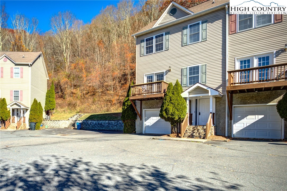259 Ridge View Drive, Unit A Boone, NC 28607 - Photo 2 of 29 a front view of a house with a yard