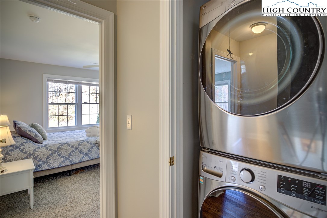 259 Ridge View Drive, Unit A Boone, NC 28607 - Photo 22 of 29 a view of livingroom with furniture and mirror