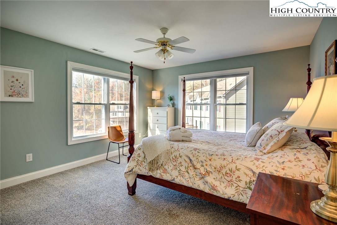 259 Ridge View Drive, Unit A Boone, NC 28607 - Photo 26 of 29 a bedroom with a bed and a window