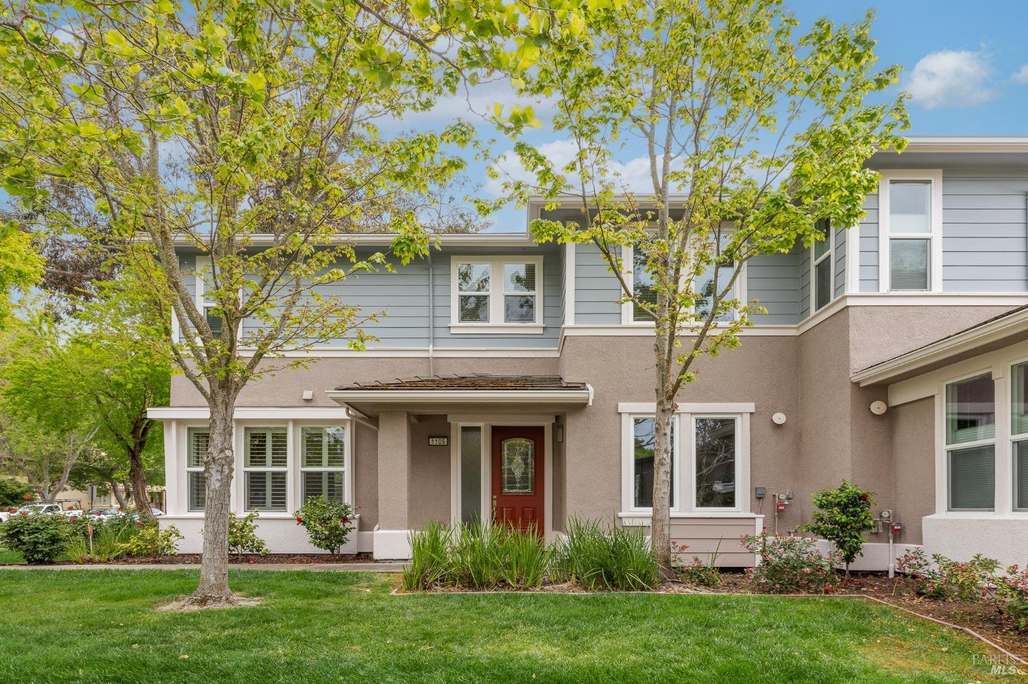 front view of a house with a yard