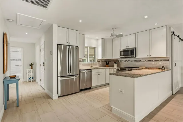 $685,000 | 1900 Benjamin Franklin Drive, Unit V12, Sarasota, FL 34236