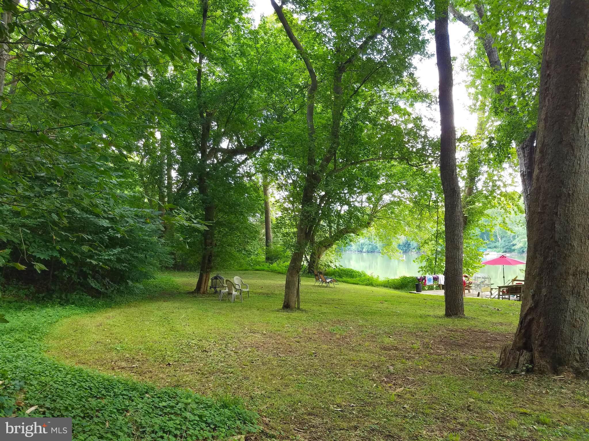 Scrabble Road Shepherdstown, WV 25443 - Photo 4 of 19 Dock/lawn area at river front