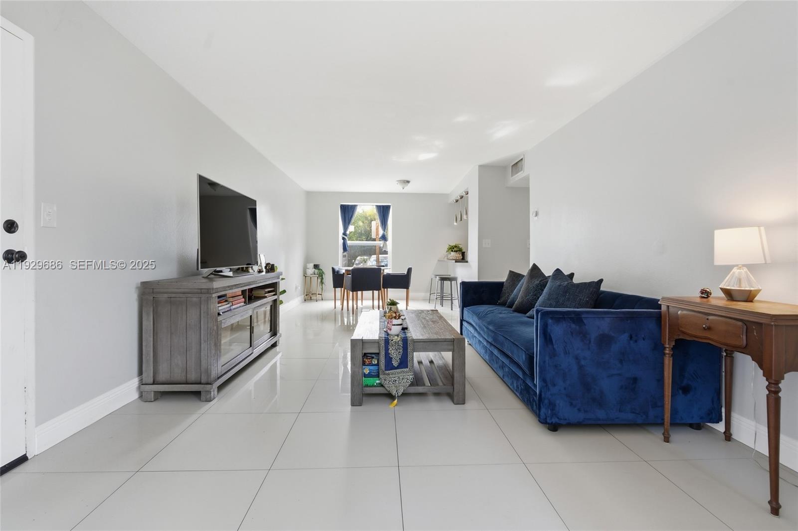 2160 Southwest 16th Avenue, Unit 120 Miami, FL 33145 - Photo 3 of 31 Bright living area