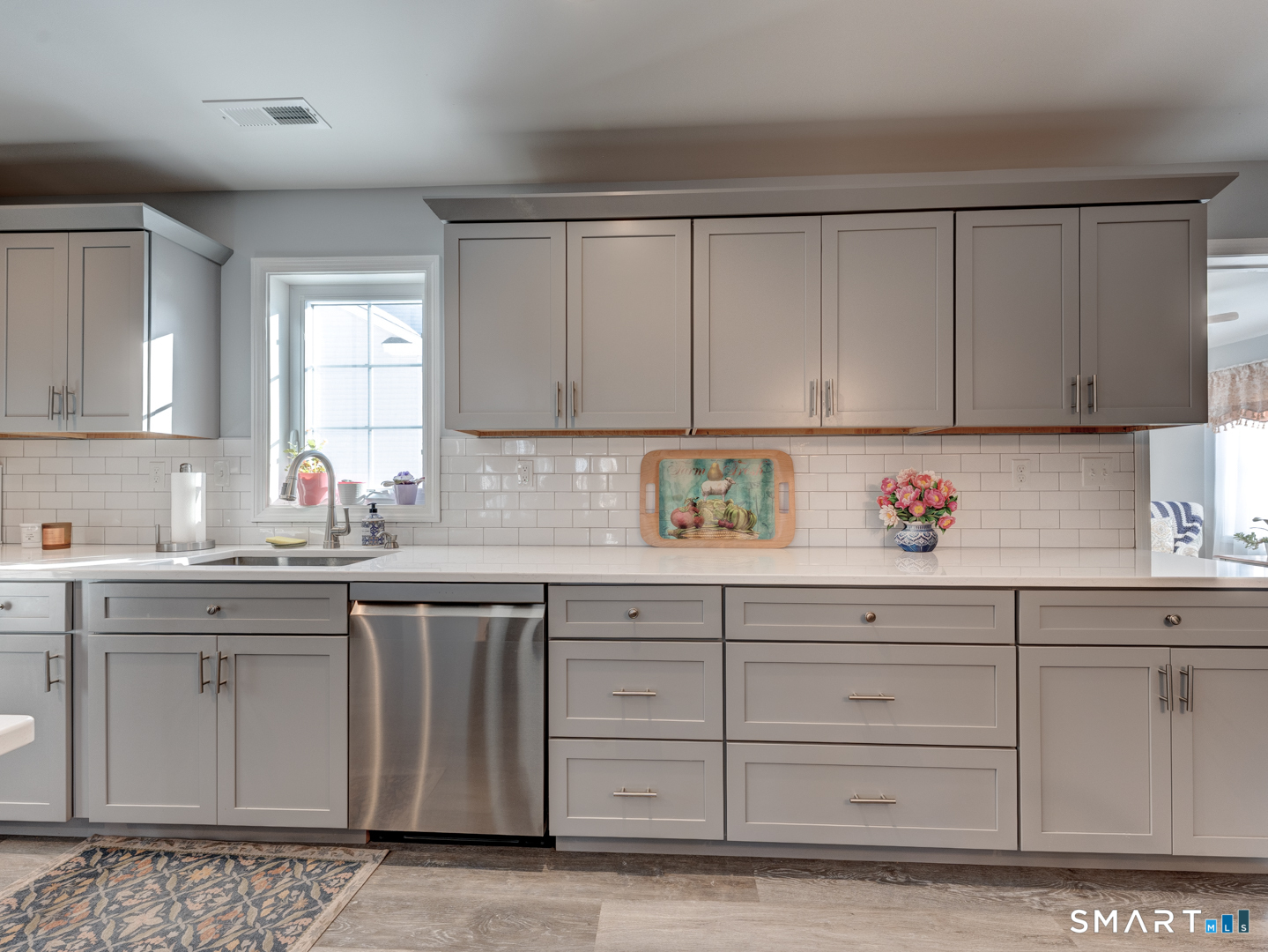 23 Hannah Way Harwinton, CT 06791 - Photo 11 of 40 a kitchen with granite countertop white cabinets and sink