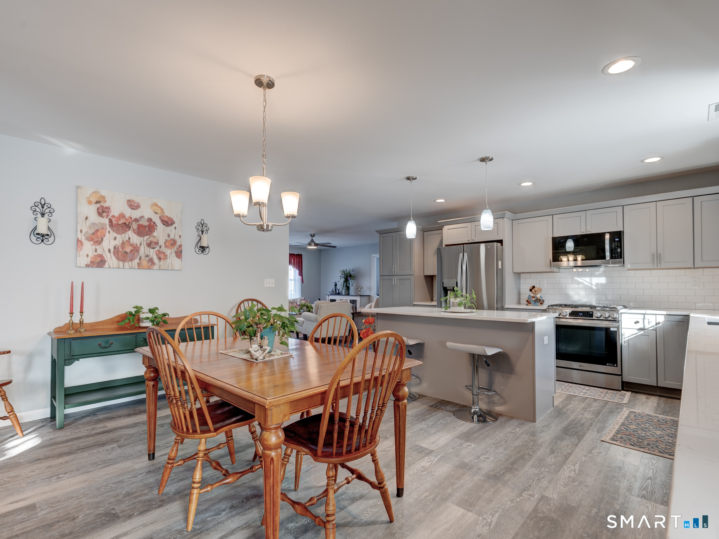 23 Hannah Way Harwinton, CT 06791 - Photo 16 of 40 a view of a dining room with furniture and wooden floor