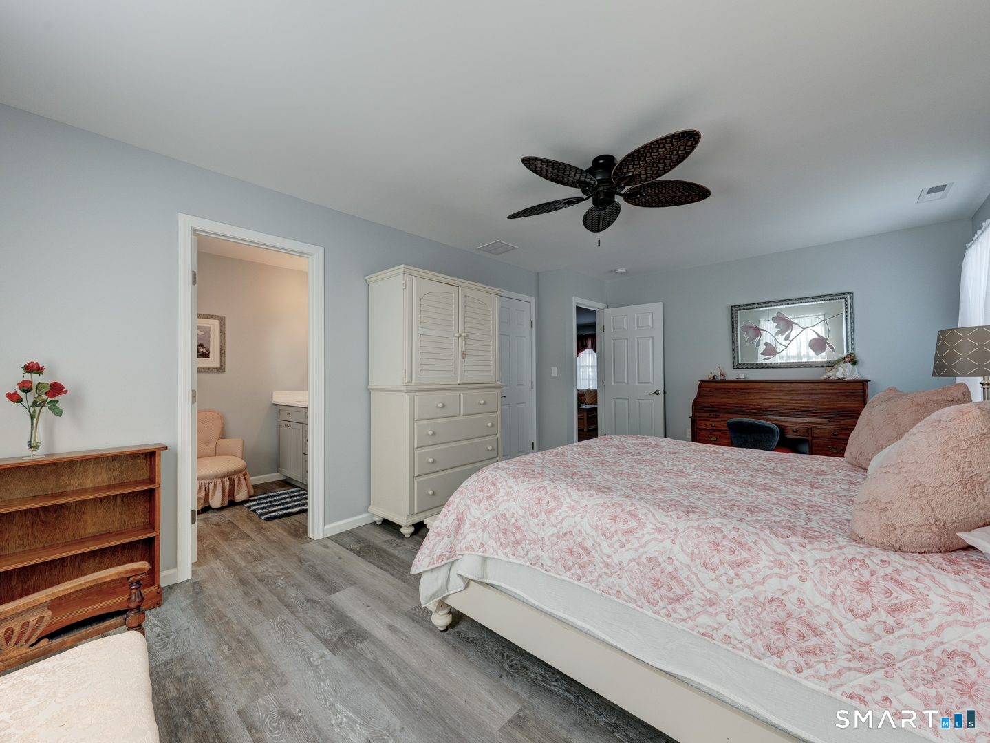 23 Hannah Way Harwinton, CT 06791 - Photo 18 of 40 a bedroom with a bed and a chandelier