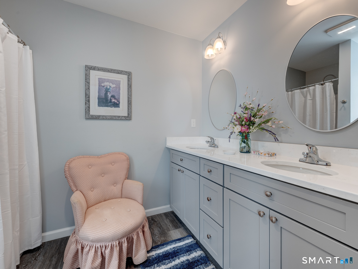 23 Hannah Way Harwinton, CT 06791 - Photo 19 of 40 a bathroom with a sink and a mirror