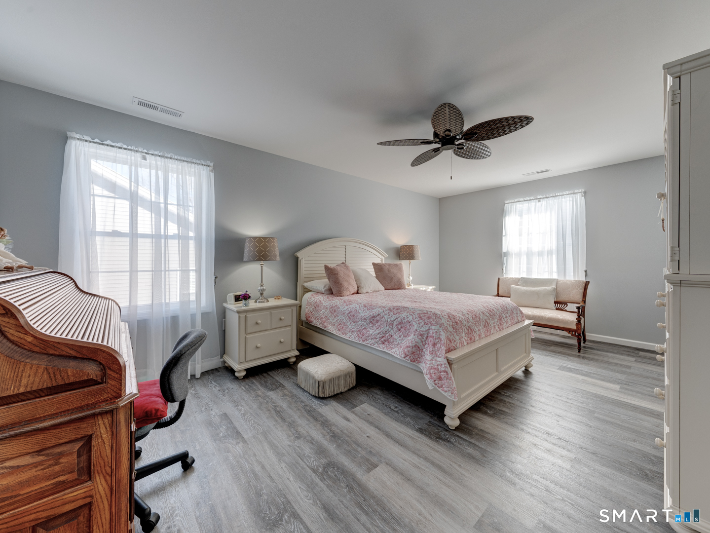 23 Hannah Way Harwinton, CT 06791 - Photo 20 of 40 a bedroom with a bed and a chandelier