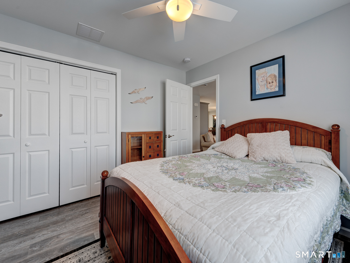 23 Hannah Way Harwinton, CT 06791 - Photo 25 of 40 a bedroom with a bed and a chandelier