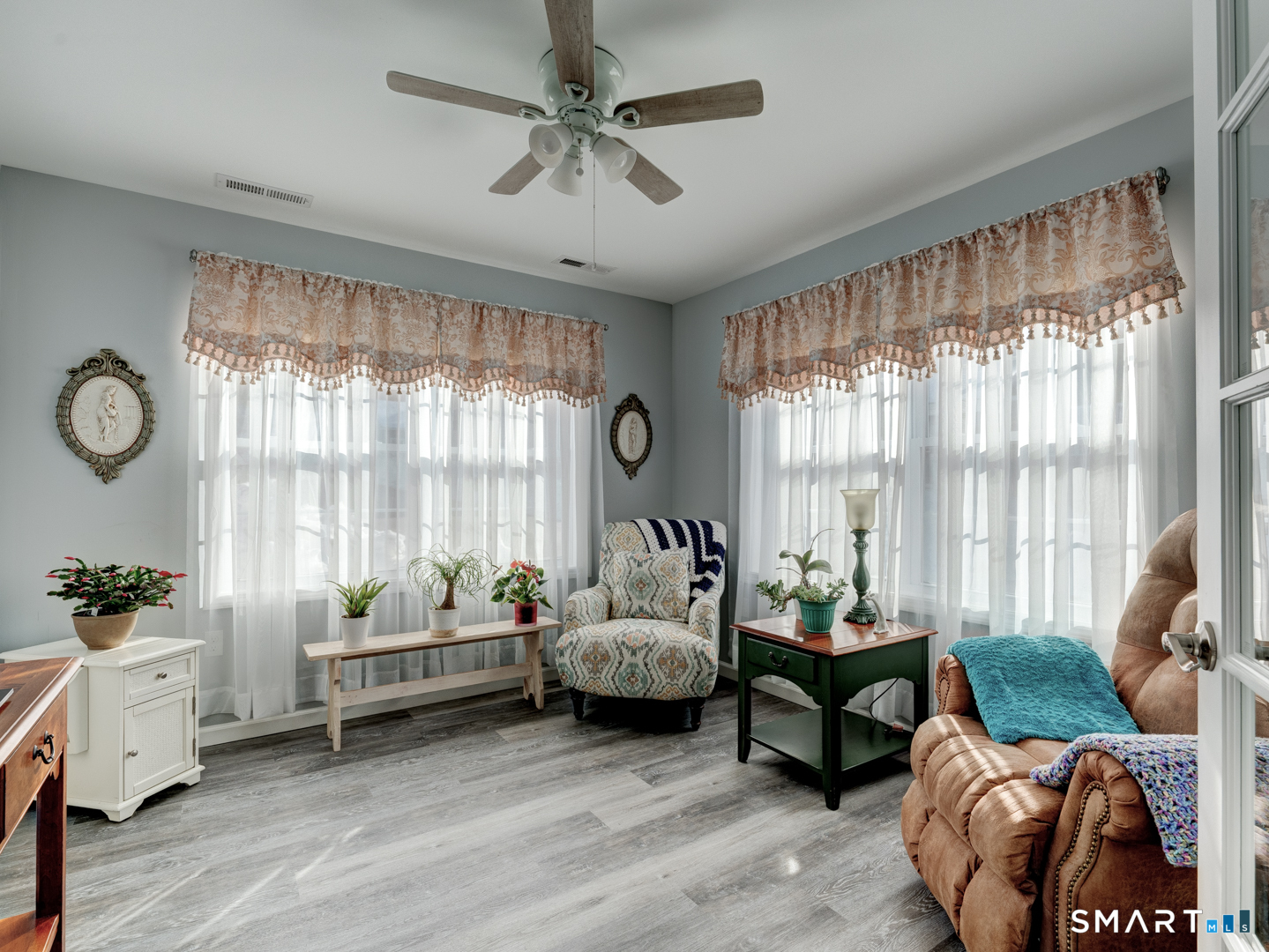 23 Hannah Way Harwinton, CT 06791 - Photo 26 of 40 a living room with furniture and a large window