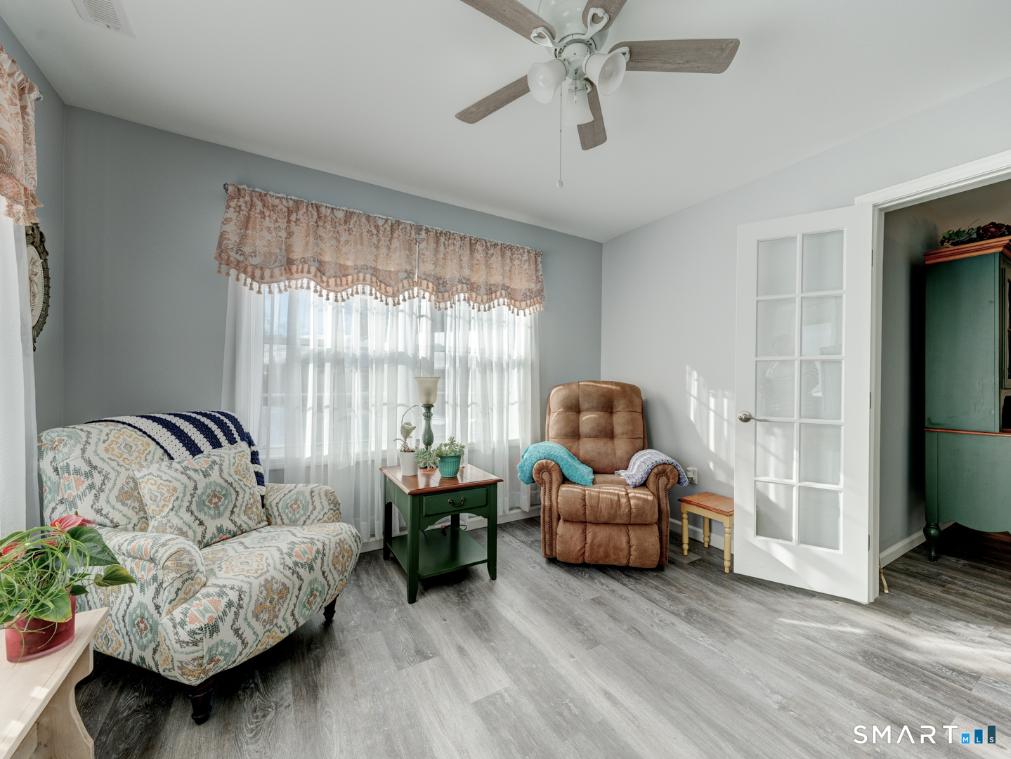 23 Hannah Way Harwinton, CT 06791 - Photo 27 of 40 a living room with furniture and a large window