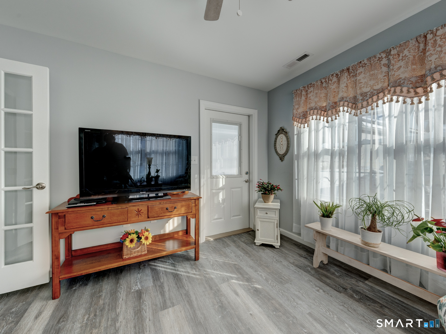 23 Hannah Way Harwinton, CT 06791 - Photo 28 of 40 a living room with furniture and a flat screen tv