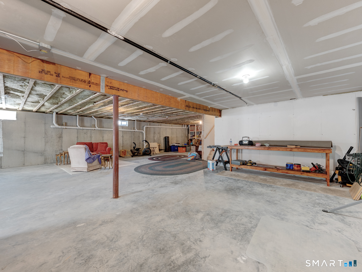 23 Hannah Way Harwinton, CT 06791 - Photo 31 of 40 a view of parking garage with cars