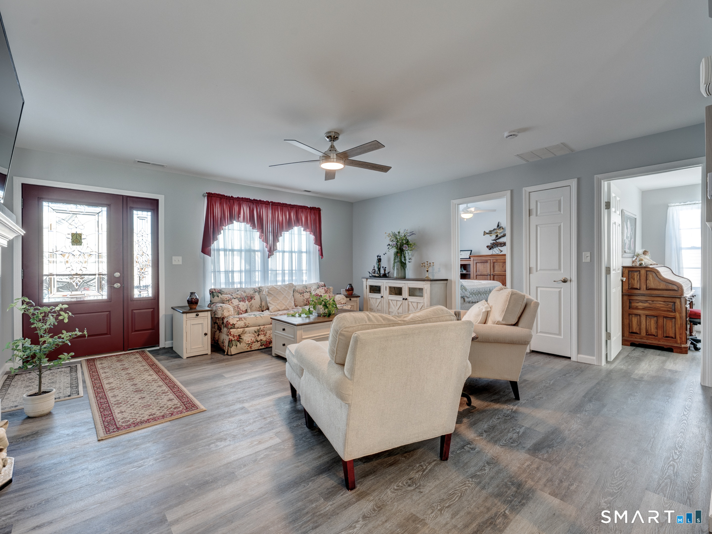 23 Hannah Way Harwinton, CT 06791 - Photo 4 of 40 a living room with furniture and a large window