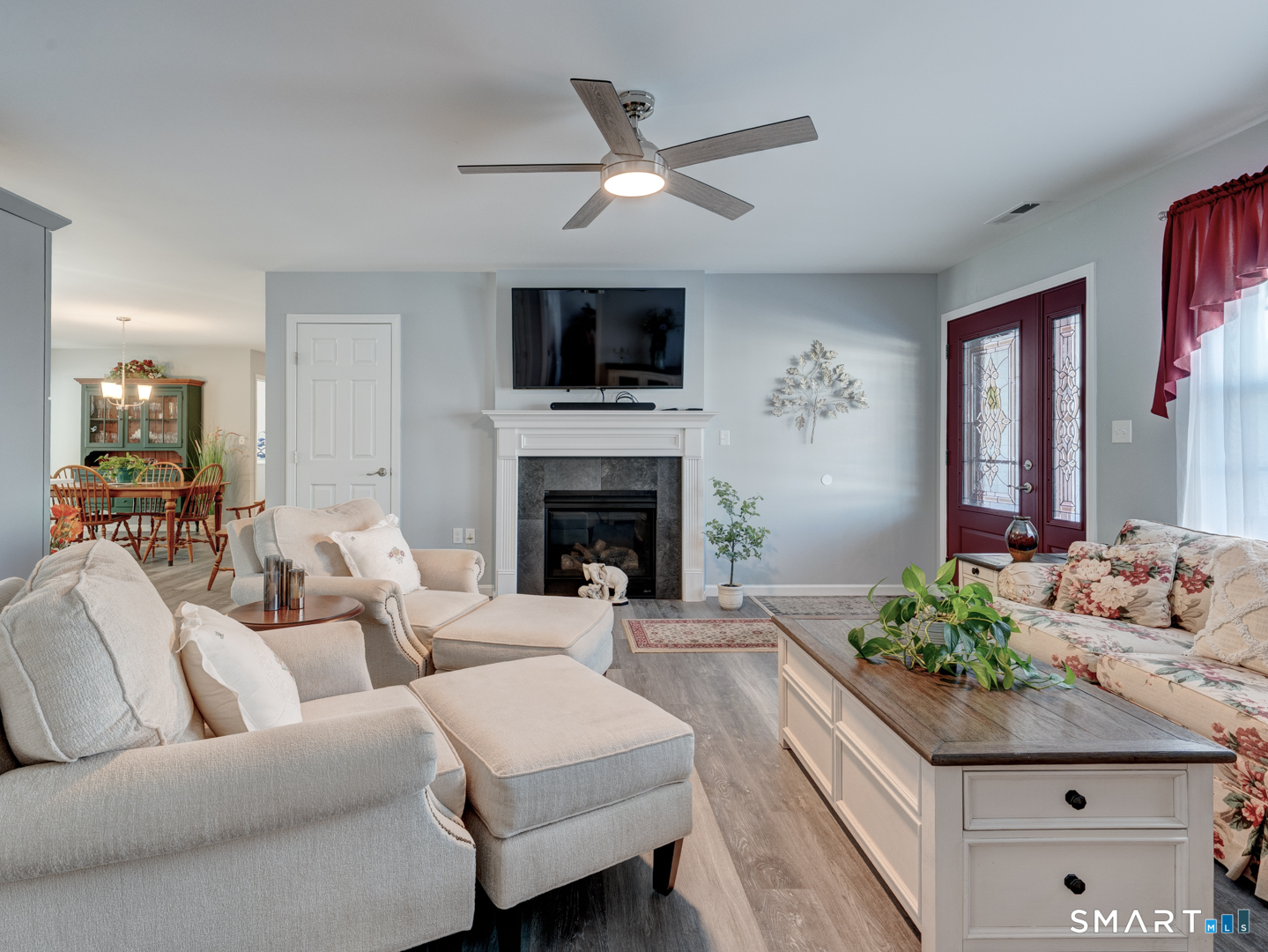 23 Hannah Way Harwinton, CT 06791 - Photo 5 of 40 a living room with furniture fireplace and flat screen tv