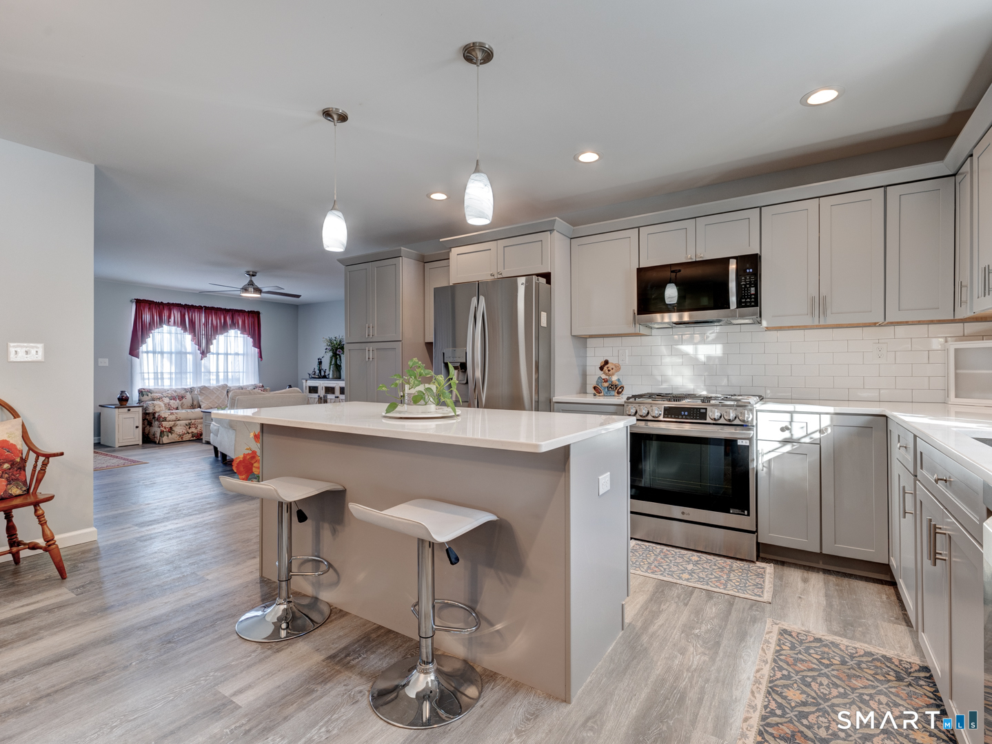 23 Hannah Way Harwinton, CT 06791 - Photo 8 of 40 a kitchen with stainless steel appliances kitchen island granite countertop a sink and cabinets