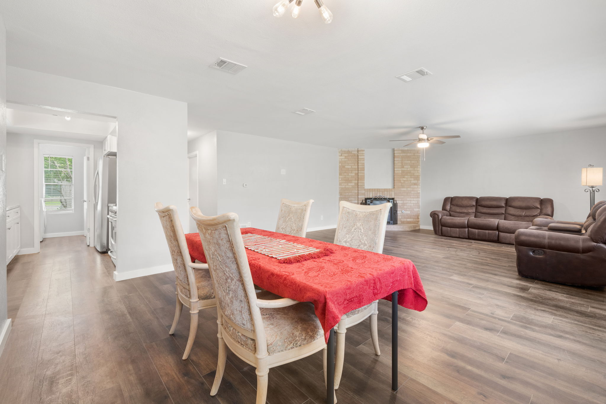 3917 Leafield Drive Austin, TX 78749 - Photo 11 of 40 Open concept dining area featuring dark wood-style floors